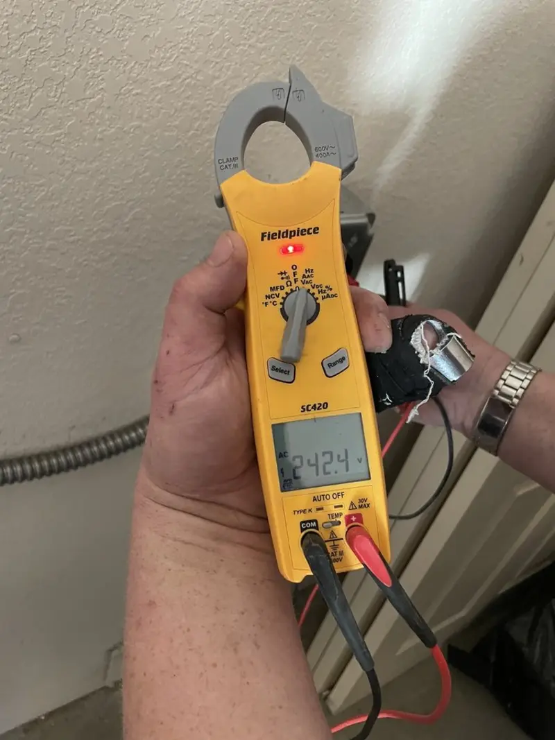 Voltage testing with clamp meter during Generator Installation in Los Osos